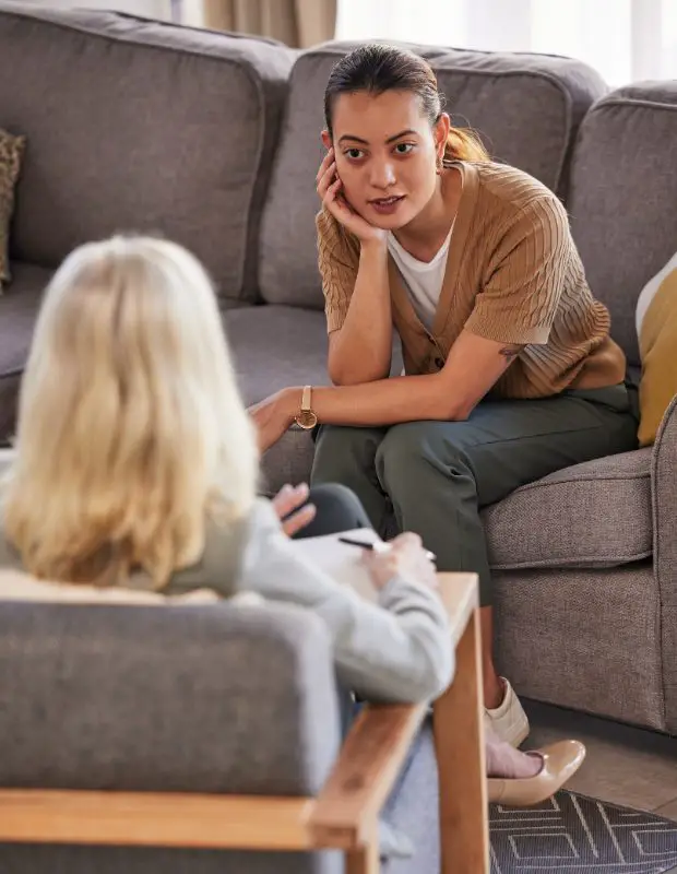 two-people-discussing-mental-wellbeing-in-a-work-environment